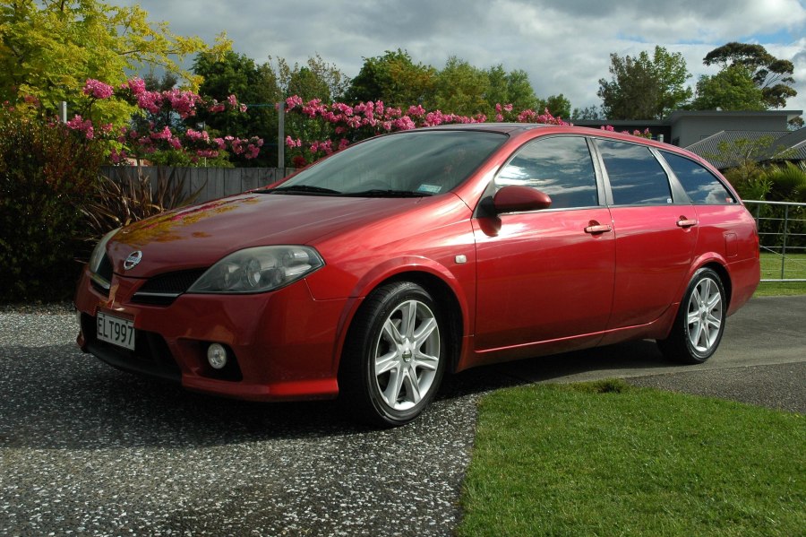 Nissan primera p12 красная