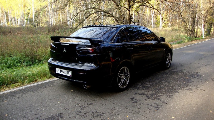 Mitsubishi Lancer 10 черный тонированный