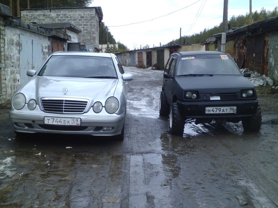 Mercedes e55 w210