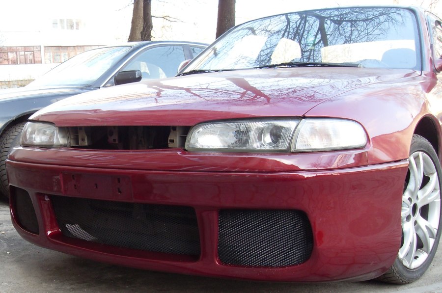 Бампер передний Mazda 626 ge