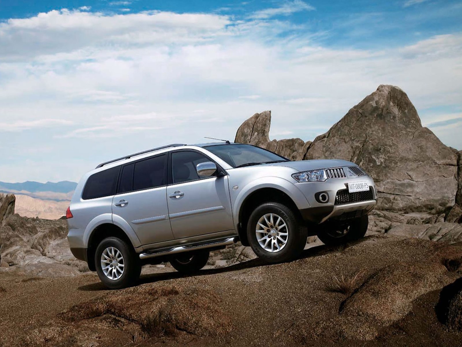 Картинка паджеро спорт. Mitsubishi Pajero Sport. MMC Pajero Sport. МИЦУБИСИПОД.жеро.спорт.. Мицубиси Паджеро и Паджеро спорт.