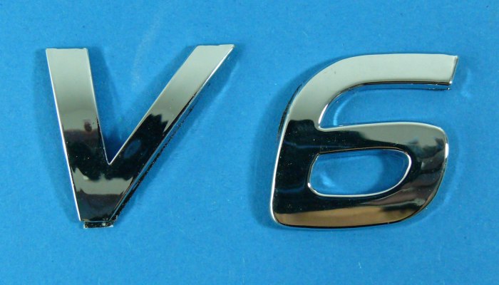 V6 Камри значок