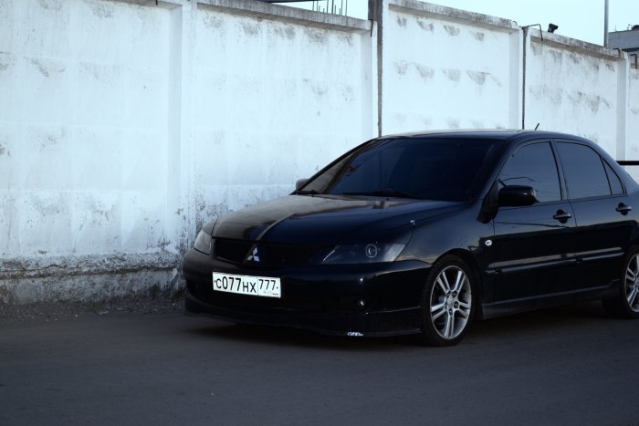 Mitsubishi Lancer 9 черный тонированный