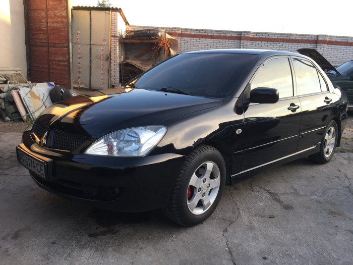 Mitsubishi Lancer 9 черный тонированный