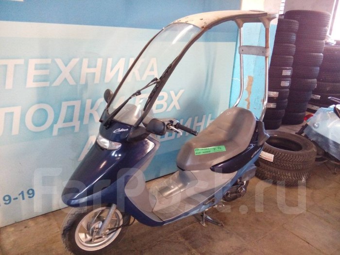 Скутер Honda cabina