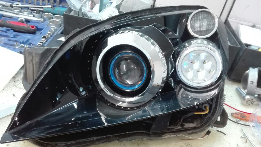 Линзы в фары Opel Astra h