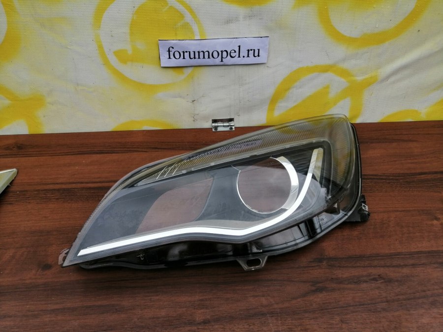 Стекло фары Opel Astra GTC