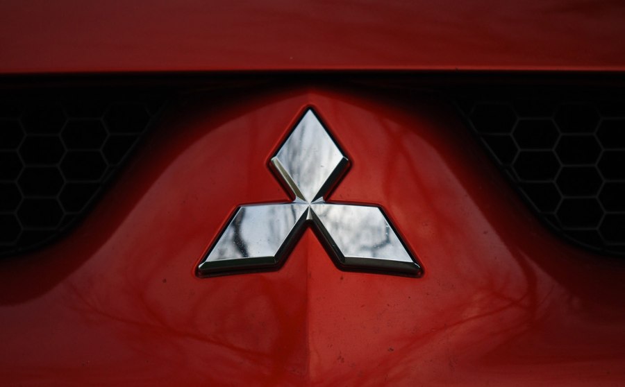 Значок машины Mitsubishi