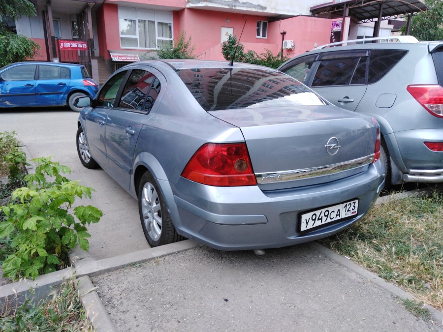 Опель Астра серо синий