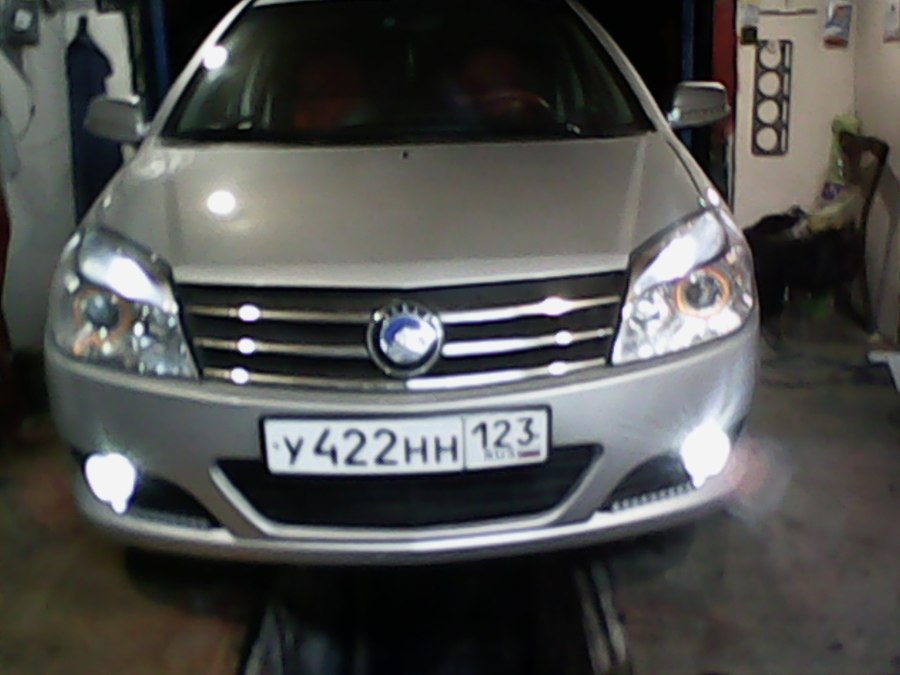 Лампа противотуманки Geely MK 2011г