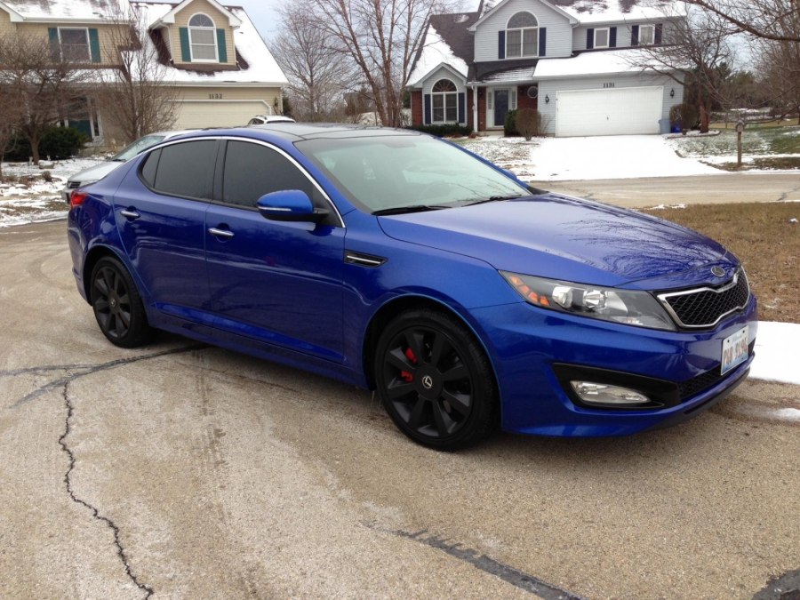 Kia Optima синяя 20 года