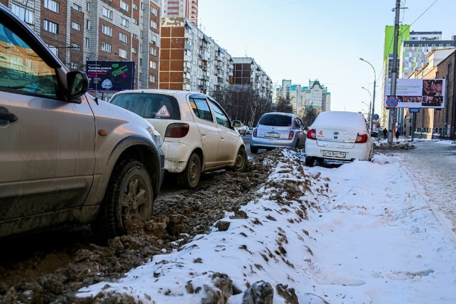 Грязные сугробы в Новосибе