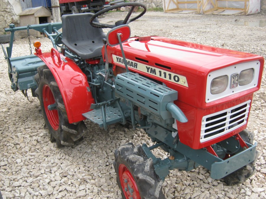 Японский трактор Yanmar ym1110d