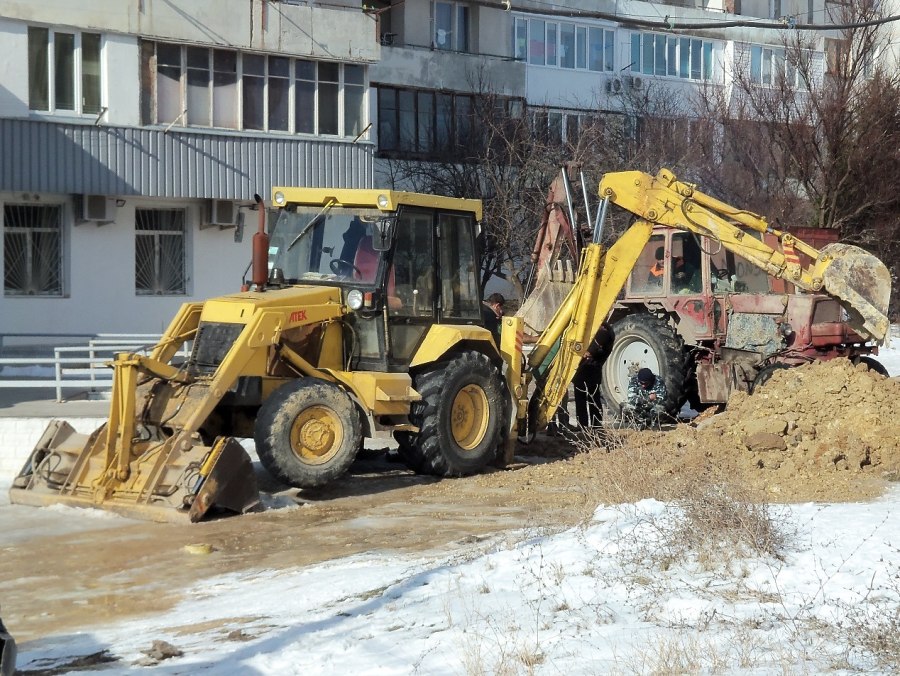 Экскаватор погрузчик АТЕК 999