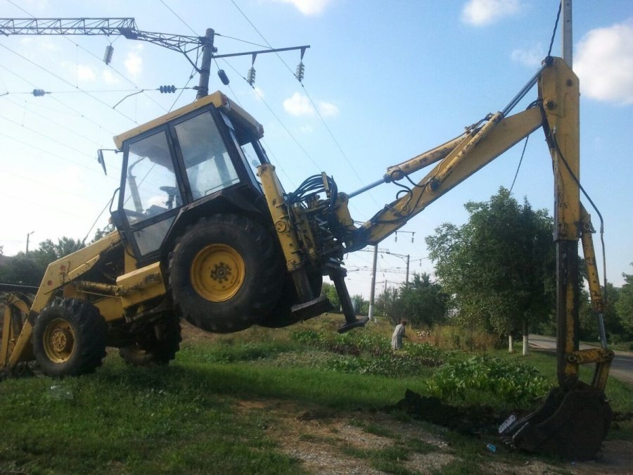 Экскаватор погрузчик АТЭК 999